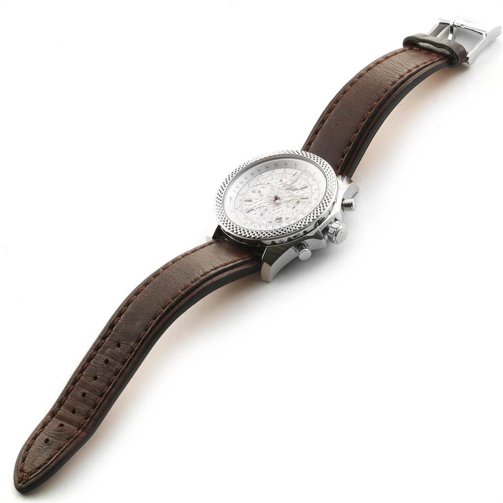 The image shows a Breitling Bentley AB0521U0/A768/789P/A20BA.1 Men's Stainless Steel Silver Dial AB0521U0/A768/789P/A20BA.1 Men's Stainless Steel Silver Dial watch at a slight side angle, displaying the face, bezel, case, crown, pushers, and leather strap.