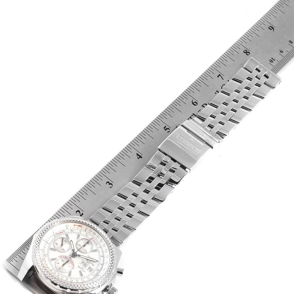 The image shows the face and metal bracelet of a Bentley model Breitling watch, with a ruler for size reference.