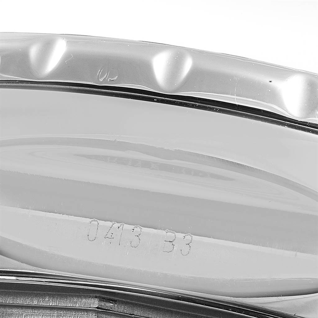 This image shows a close-up of the side of the Bentley model by Breitling, focusing on the bezel and serial number.