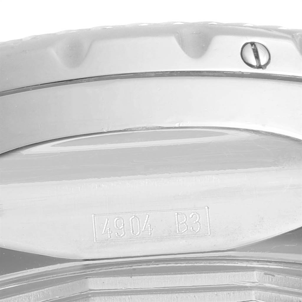 The image shows a close-up of the side case and bezel of a Bentley model by Breitling, featuring a visible screw and engraving.