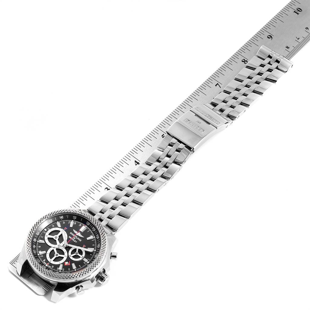 The Breitling Bentley A25366 Men
s Stainless Steel Black Dial A25366 Men
s Stainless Steel Black Dial model watch is shown flat with its face, bracelet, and clasp fully visible, alongside a ruler for scale.