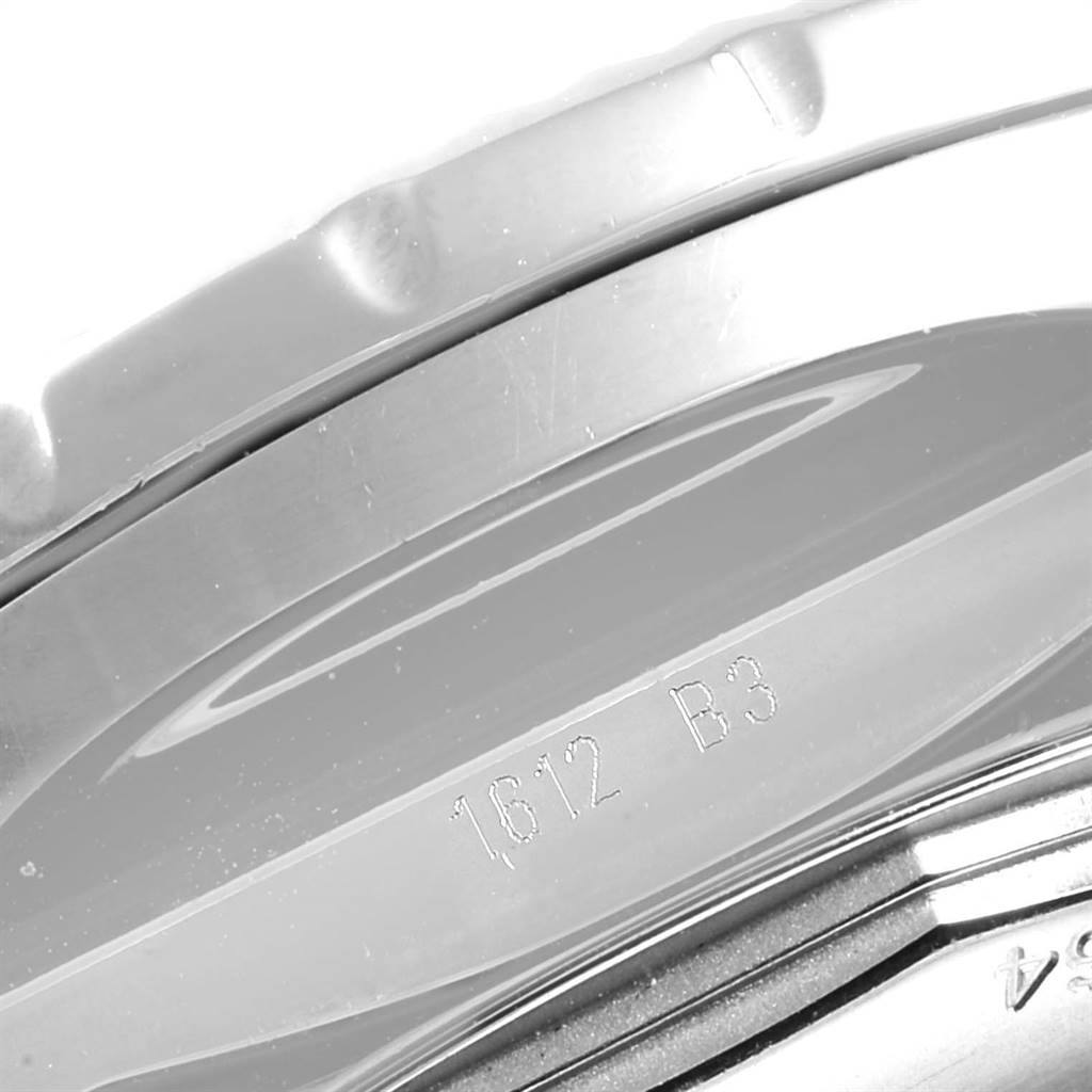 The image shows a close-up of the edge and side details of a Breitling Bentley A26364 Men
s Stainless Steel Black Dial A26364 Men
s Stainless Steel Black Dial watch, including part of its serial number.