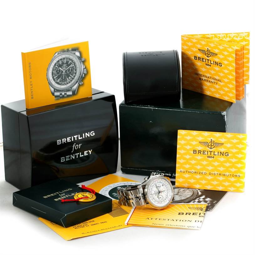 The image shows the packaging and accessories of the Breitling Bentley A25362 Men
s Stainless Steel White Dial A25362 Men
s Stainless Steel White Dial model, including manuals, warranty papers, and the watch itself.