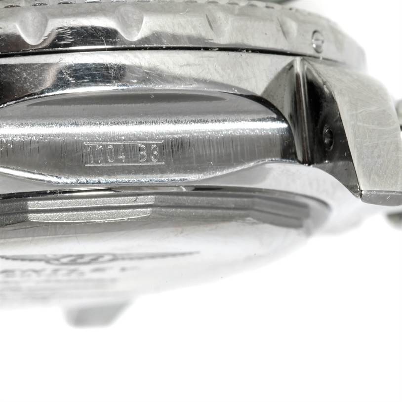 The image shows a detailed side view of a Breitling Bentley A25362 Men
s Stainless Steel White Dial A25362 Men
s Stainless Steel White Dial watch, focusing on the casing and part of the bezel.