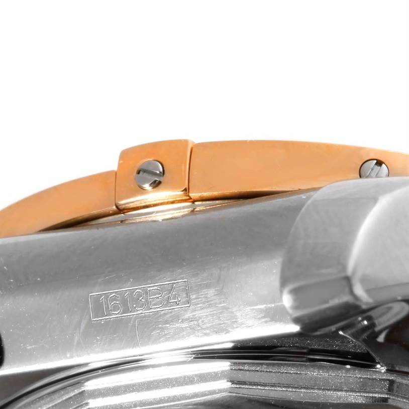 The image shows a close-up side view of a Breitling Chronomat CB0110 Men's Steel and Gold (two tone) Blue Dial CB0110 Men's Steel and Gold (two tone) Blue Dial watch, focusing on the bezel and part of the stainless steel case.