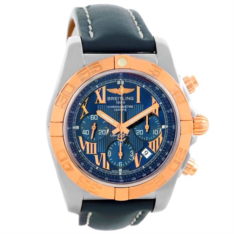 The image shows a front-view angle of a Breitling Chronomat CB0110 Men's Steel and Gold (two tone) Blue Dial CB0110 Men's Steel and Gold (two tone) Blue Dial watch, featuring its face, bezel, crown, and leather strap.