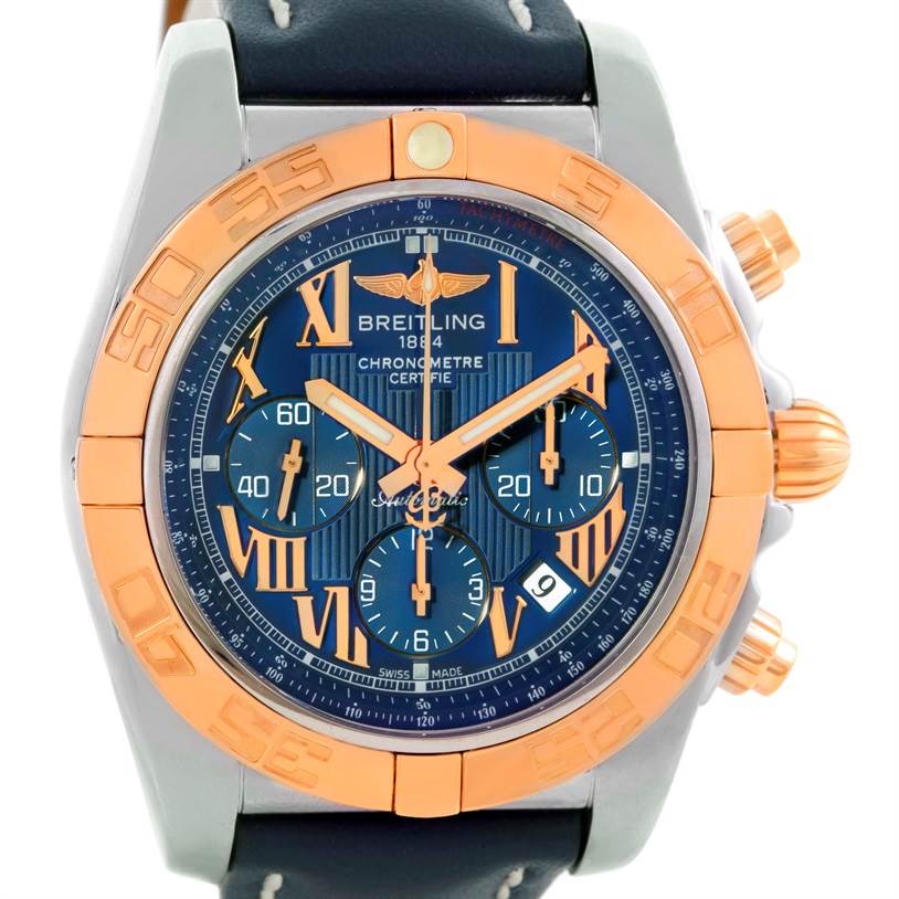 The image shows a straight-front view of the Breitling Chronomat CB0110 Men's Steel and Gold (two tone) Blue Dial CB0110 Men's Steel and Gold (two tone) Blue Dial watch displaying its face, bezel, and part of the strap.