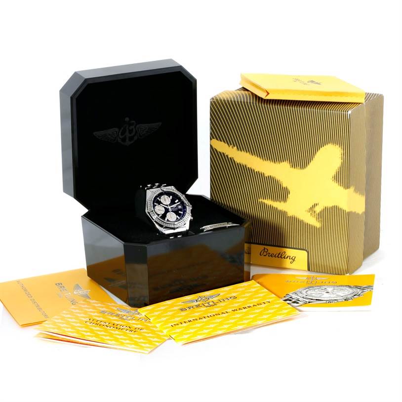 The image shows a Breitling Chronomat A13352 Men's Stainless Steel Black Dial A13352 Men's Stainless Steel Black Dial watch at an angle inside its presentation box, with accompanying accessories and documentation.