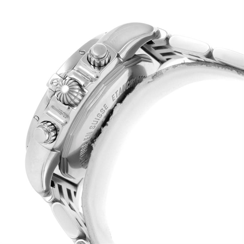 The image shows a side view of the Breitling Chronomat AB0410 Men
s Stainless Steel Blue Dial AB0410 Men
s Stainless Steel Blue Dial watch focusing on the crown, pushers, and part of the bracelet.