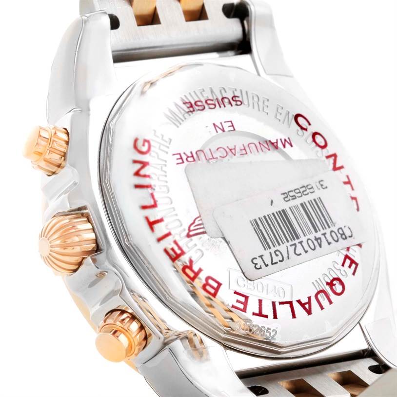 The image shows the back case and side view of the Breitling Chronomat CB014012-G713-378C Men
s Steel and Gold (two tone) White Dial CB014012-G713-378C Men
s Steel and Gold (two tone) White Dial model watch, highlighting its pushers and crown.