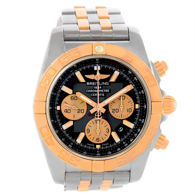 This image shows the Breitling Chronomat CB0110 Men's Steel and Gold (two tone) Black Dial CB0110 Men's Steel and Gold (two tone) Black Dial watch from the front, showcasing its dial, bezel, and part of the bracelet.