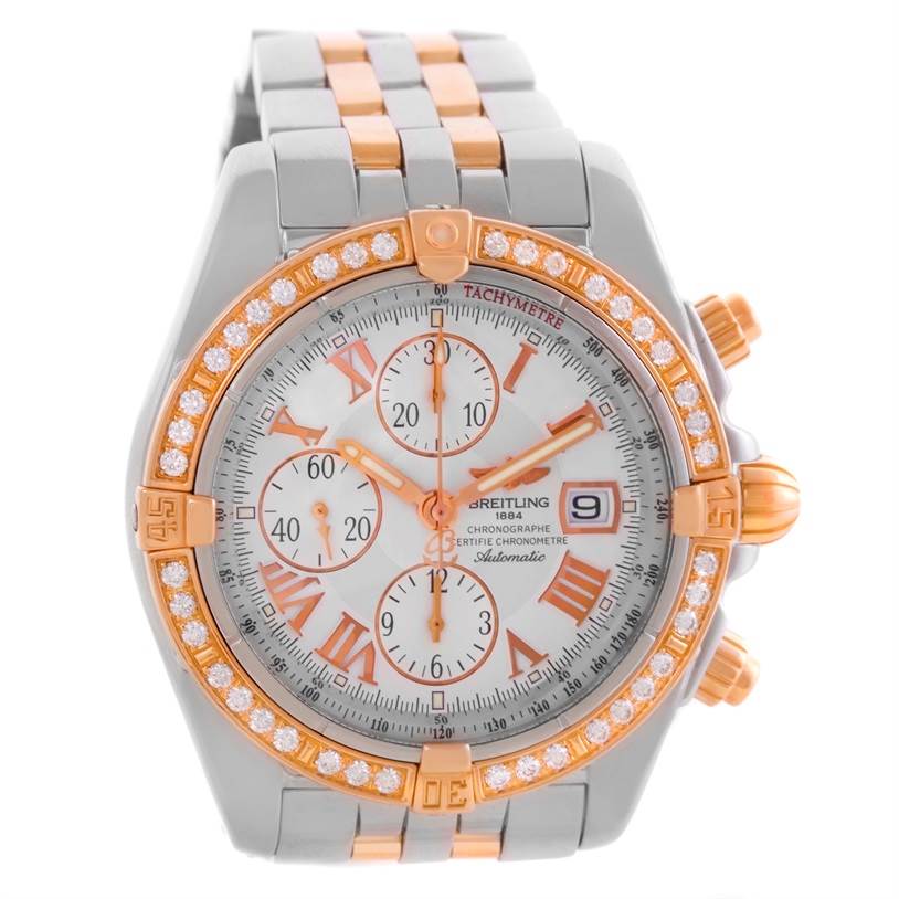 This image shows a frontal view of the Breitling Chronomat C13356 Men's Steel and Gold (two tone) White Dial C13356 Men's Steel and Gold (two tone) White Dial watch, highlighting its dial, bezel, and part of its bracelet.