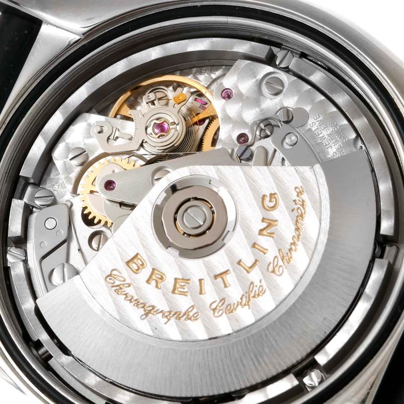 This image shows the inner mechanical workings and rotor of the Breitling Chronomat A13356 Men
s Stainless Steel Grey Dial A13356 Men
s Stainless Steel Grey Dial watch from a close-up angle.