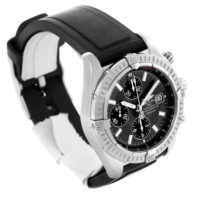 The image shows a Breitling Chronomat A13356 Men
s Stainless Steel Grey Dial A13356 Men
s Stainless Steel Grey Dial watch at a three-quarter angle highlighting its face, bezel, and rubber strap.