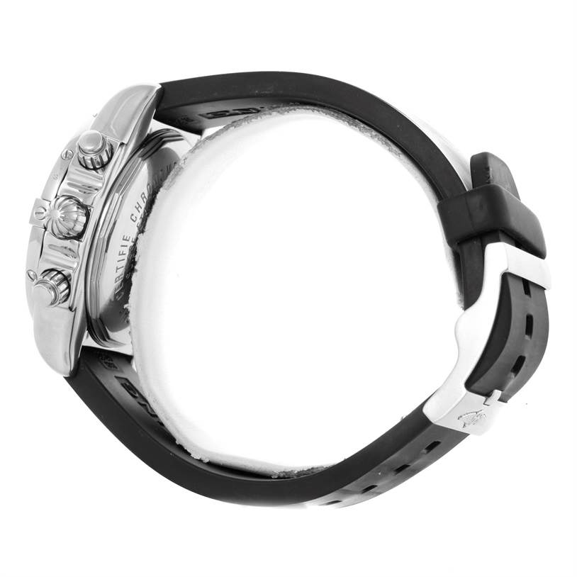 The image showcases the side view of the Breitling Chronomat A13356 Men
s Stainless Steel Grey Dial A13356 Men
s Stainless Steel Grey Dial, highlighting the watch case, crown, pushers, and a portion of the rubber strap.