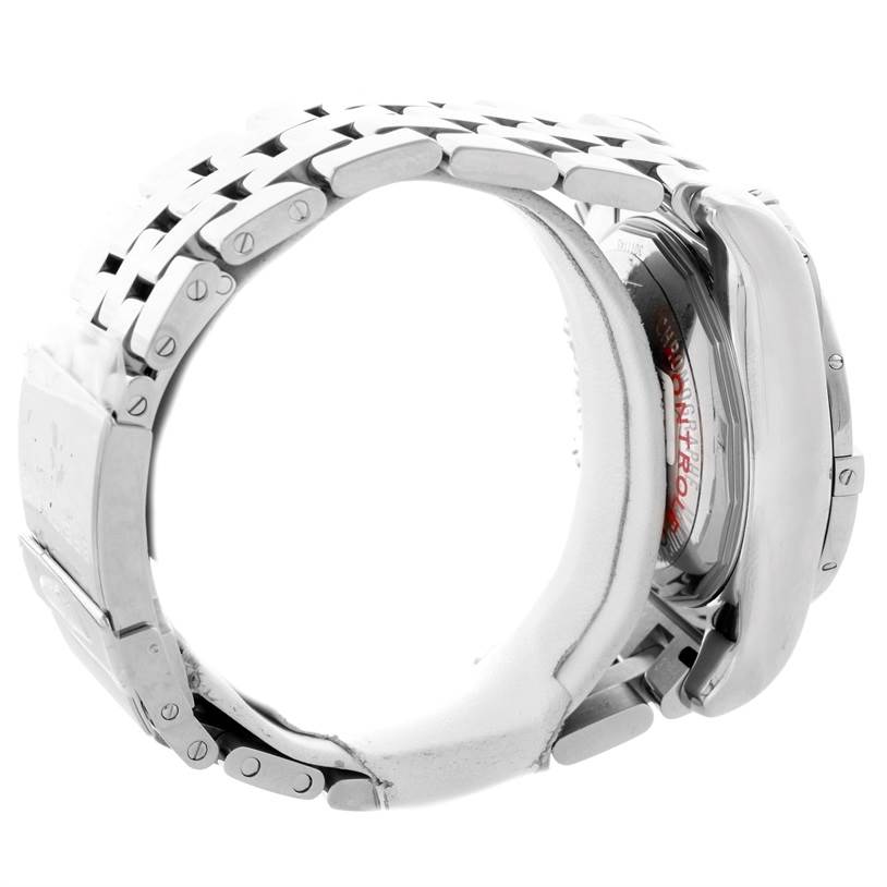 The image shows a side view of a Breitling Chronomat AB0110 Men
s Stainless Steel White Dial AB0110 Men
s Stainless Steel White Dial model, highlighting the bracelet and a partial view of the case back.