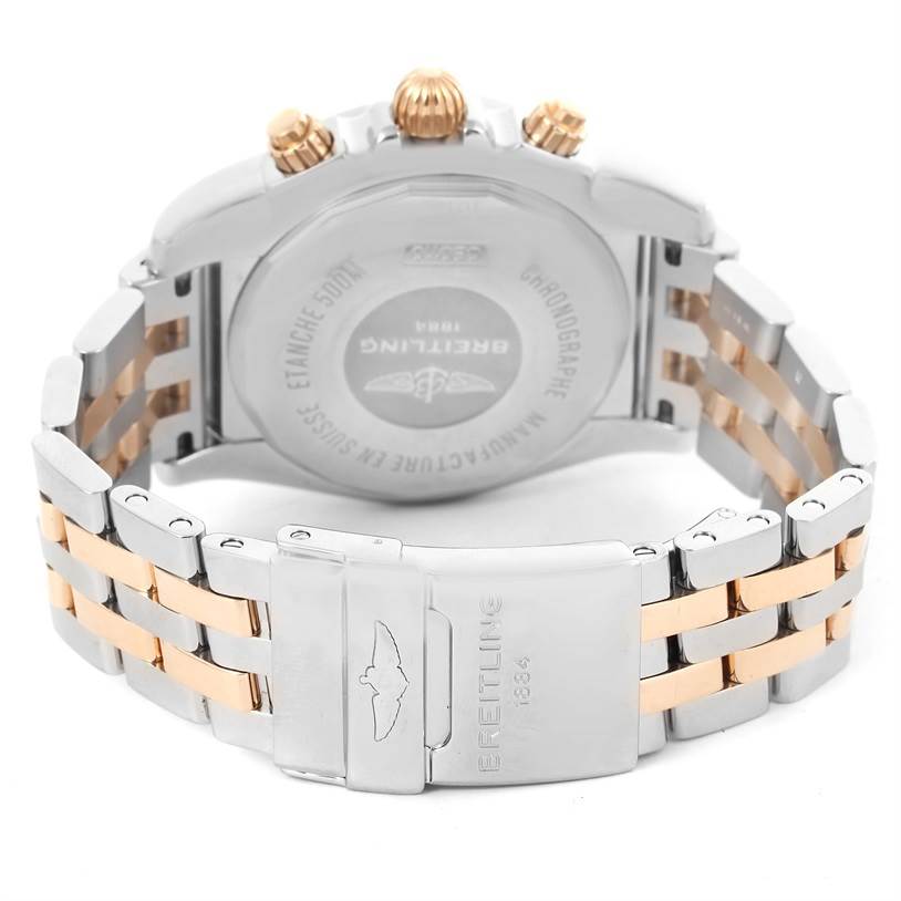 This image shows the back case and bracelet of a Breitling Chronomat CB0110 Men's Steel and Gold (two tone) Black Dial CB0110 Men's Steel and Gold (two tone) Black Dial watch, highlighting the two-tone metal design and clasp.