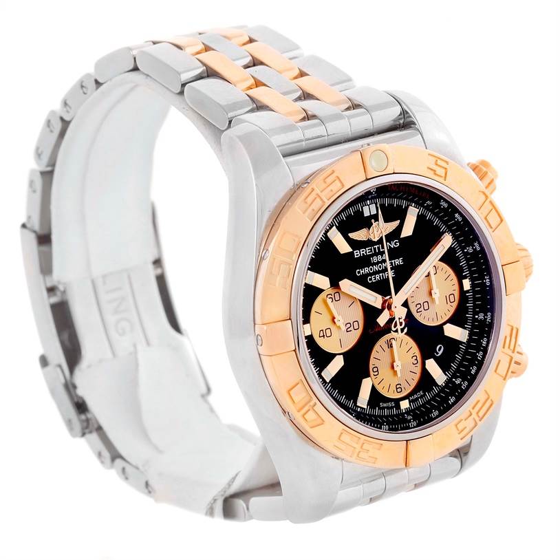 The image shows a Breitling Chronomat CB0110 Men's Steel and Gold (two tone) Black Dial CB0110 Men's Steel and Gold (two tone) Black Dial watch at a three-quarter angle, highlighting the dial, bezel, and bracelet.
