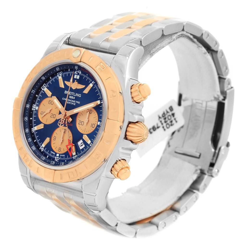 The Breitling Chronomat CB042012/C858 Men's Steel and Gold (two tone) Blue Dial CB042012/C858 Men's Steel and Gold (two tone) Blue Dial watch is shown at a three-quarters angle, highlighting its bezel, dial, pushers, and bracelet.
