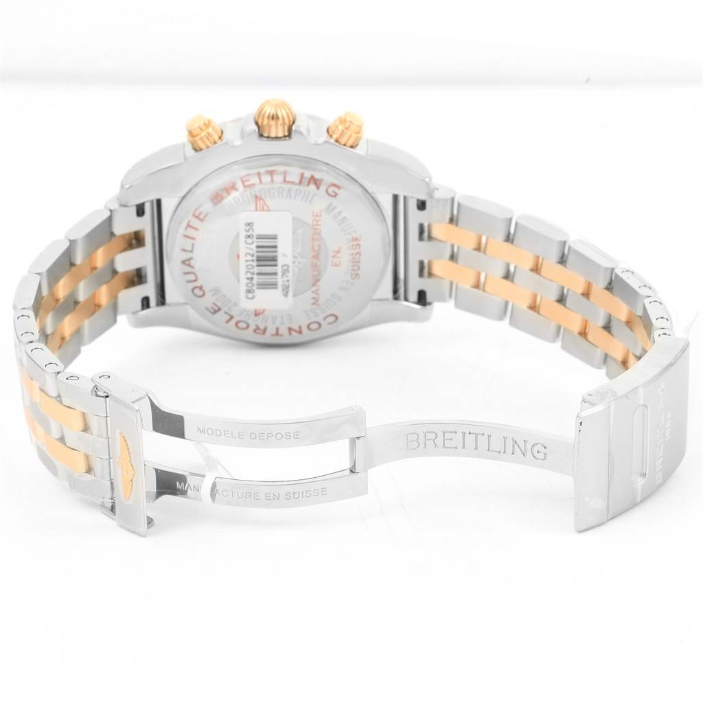 The image shows the back view of a Breitling Chronomat CB042012/C858 Men's Steel and Gold (two tone) Blue Dial CB042012/C858 Men's Steel and Gold (two tone) Blue Dial watch displaying its clasp and bracelet.