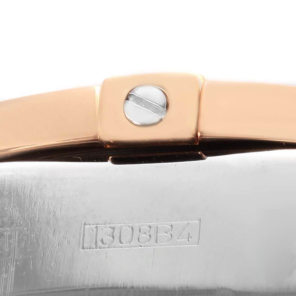 This close-up image shows the clasp and part of the bracelet of the Breitling Chronomat C13356 Men's Steel and Gold (two tone) White Dial C13356 Men's Steel and Gold (two tone) White Dial watch.