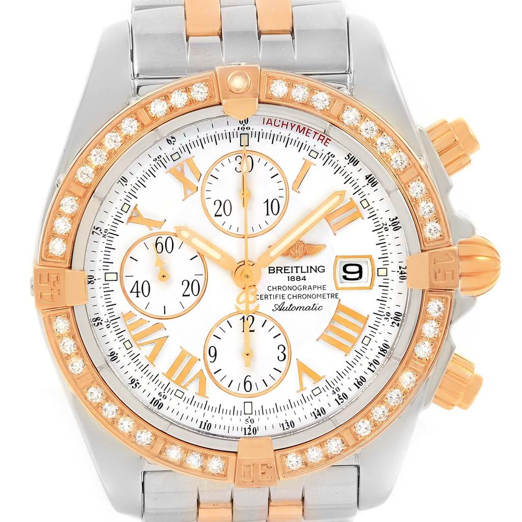 The image shows a front view of the Breitling Chronomat C13356 Men's Steel and Gold (two tone) White Dial C13356 Men's Steel and Gold (two tone) White Dial watch, highlighting its dial, bezel, and part of the bracelet.