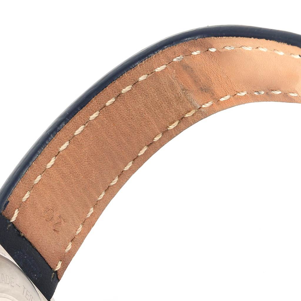 The image shows the underside of a leather strap for a Breitling Chronomat B13047 Men
s Steel and Gold (two tone) White Dial B13047 Men
s Steel and Gold (two tone) White Dial watch, featuring the stitching and part of the case.
