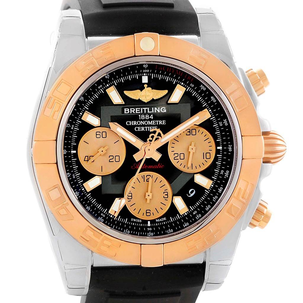 The image shows a Breitling Chronomat CB0140 Men's Steel and Gold (two tone) Black Dial CB0140 Men's Steel and Gold (two tone) Black Dial watch from a straight-on angle, highlighting its dial, bezel, and chronographs.