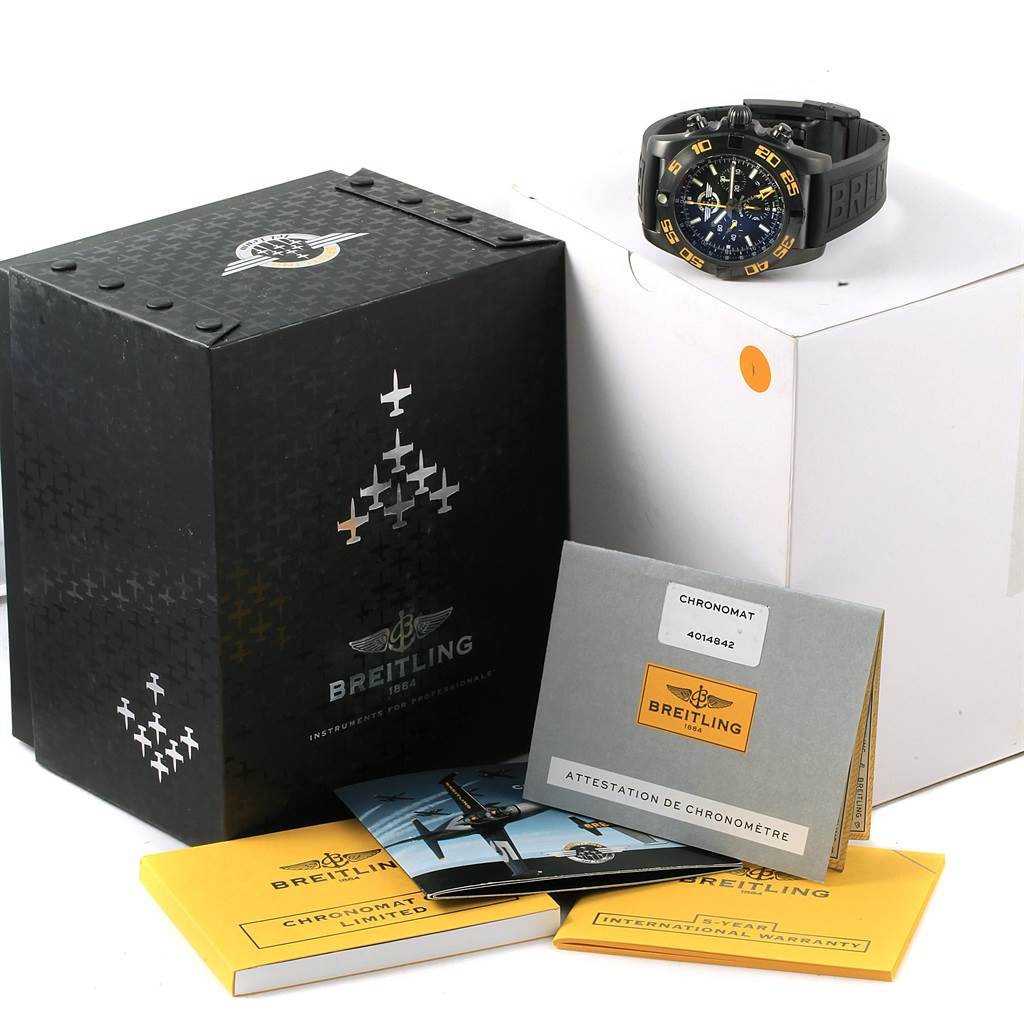 The image shows the Breitling Chronomat MB0410 Men's Stainless Steel Black Dial MB0410 Men's Stainless Steel Black Dial watch at a slight angle, along with its packaging and documentation accessories.