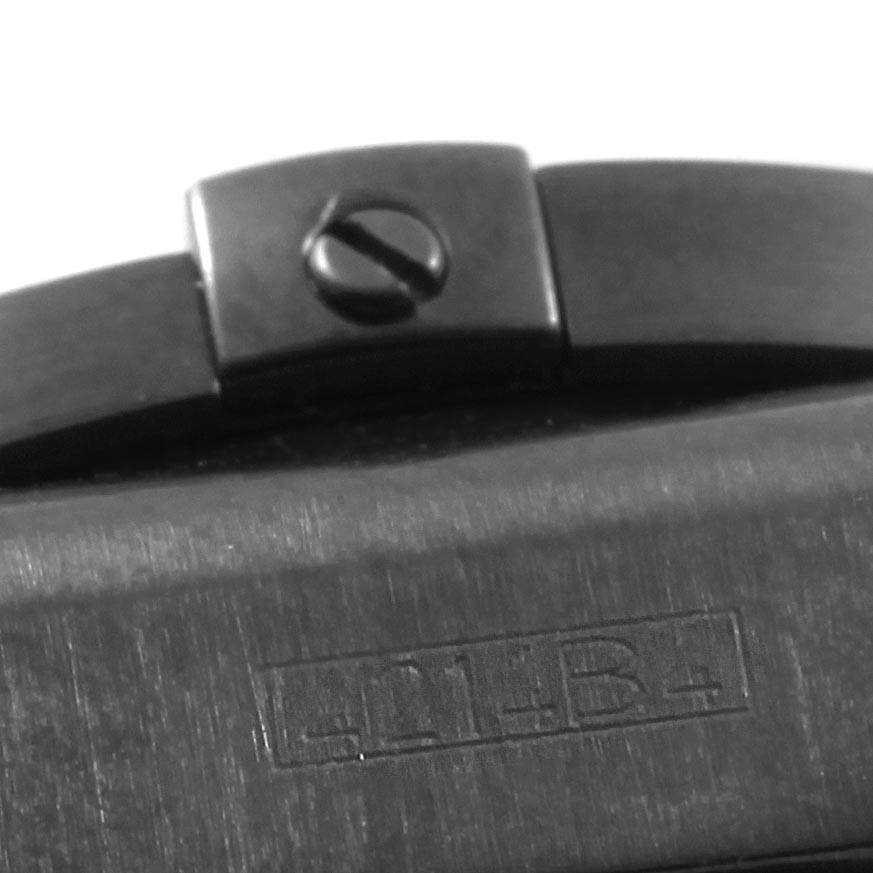 The image shows a close-up of the clasp and part of the metal bracelet of a Breitling Chronomat MB0141 Men's Stainless Steel Black Dial MB0141 Men's Stainless Steel Black Dial watch.