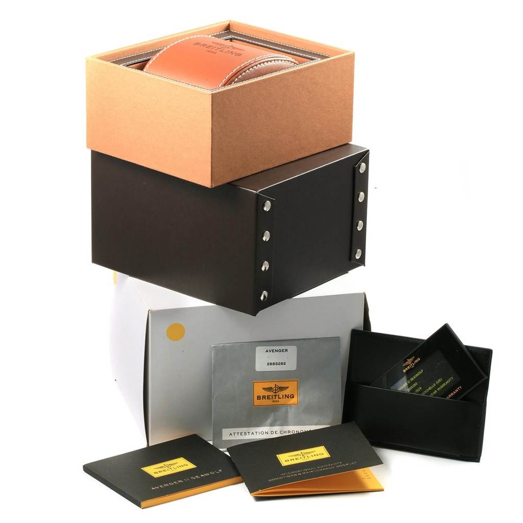 The image shows the packaging, documentation, and accessories for a Breitling Chronomat A17331 Men's Stainless Steel Yellow Dial A17331 Men's Stainless Steel Yellow Dial watch.