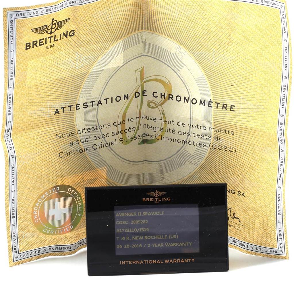 The image shows a Breitling Chronomat A17331 Men's Stainless Steel Yellow Dial A17331 Men's Stainless Steel Yellow Dial warranty card and COSC certification.