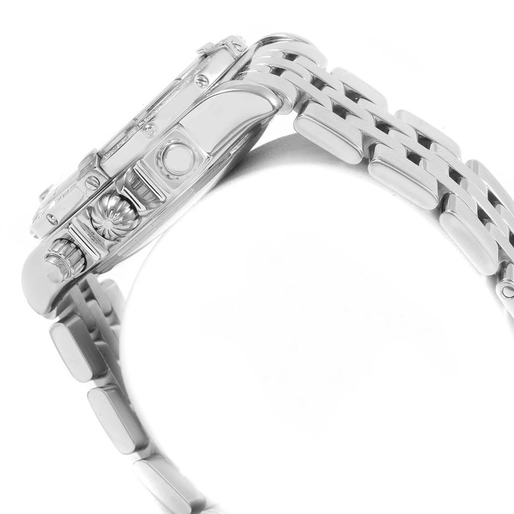 The image shows a side view of the Breitling Chronomat A13356 Men's Stainless Steel Mother of Pearl Dial A13356 Men's Stainless Steel Mother of Pearl Dial watch, highlighting the bezel, crown, and metal bracelet.