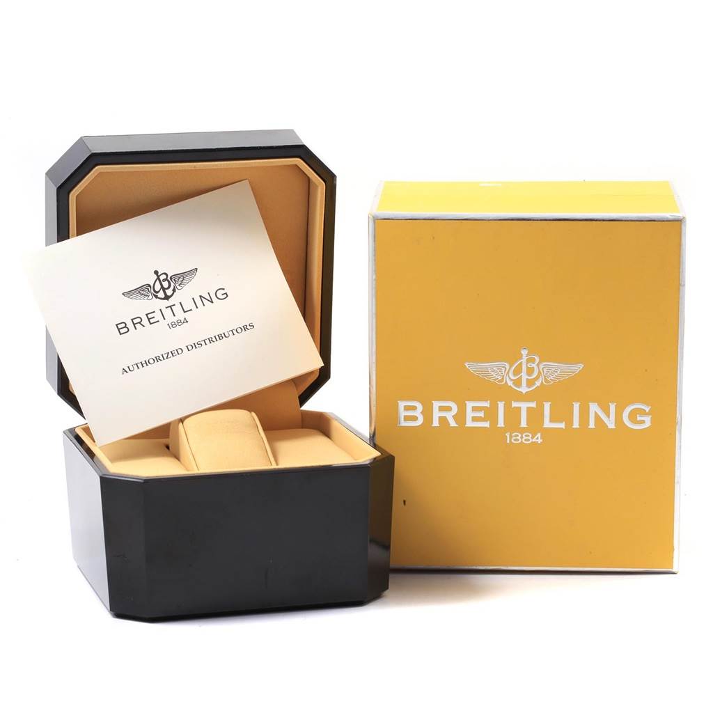 The image shows the Breitling Chronomat A13356 Men's Stainless Steel Mother of Pearl Dial A13356 Men's Stainless Steel Mother of Pearl Dial watch's box, an open display case, and documentation from an angled view.