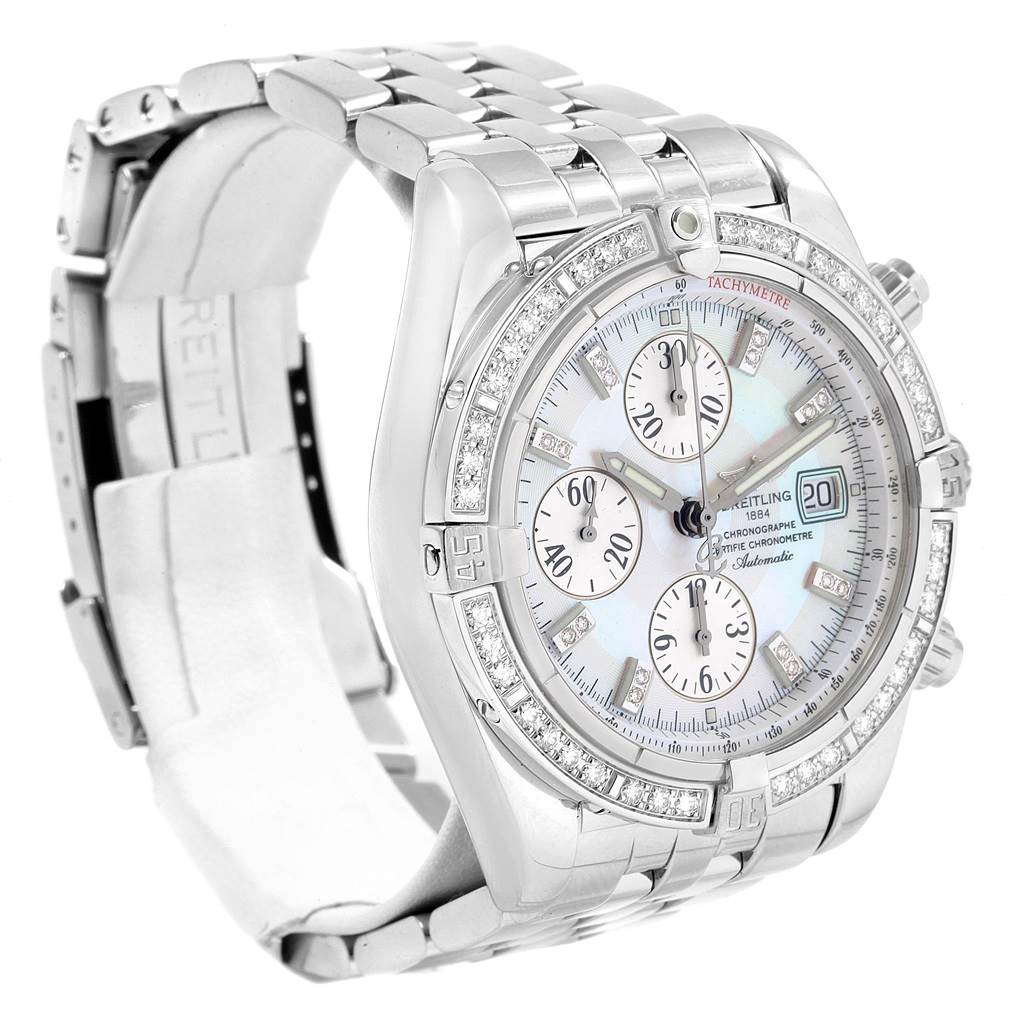 The image shows a Breitling Chronomat A13356 Men's Stainless Steel Mother of Pearl Dial A13356 Men's Stainless Steel Mother of Pearl Dial watch at an angle highlighting the face, bezel, bracelet, and open clasp.