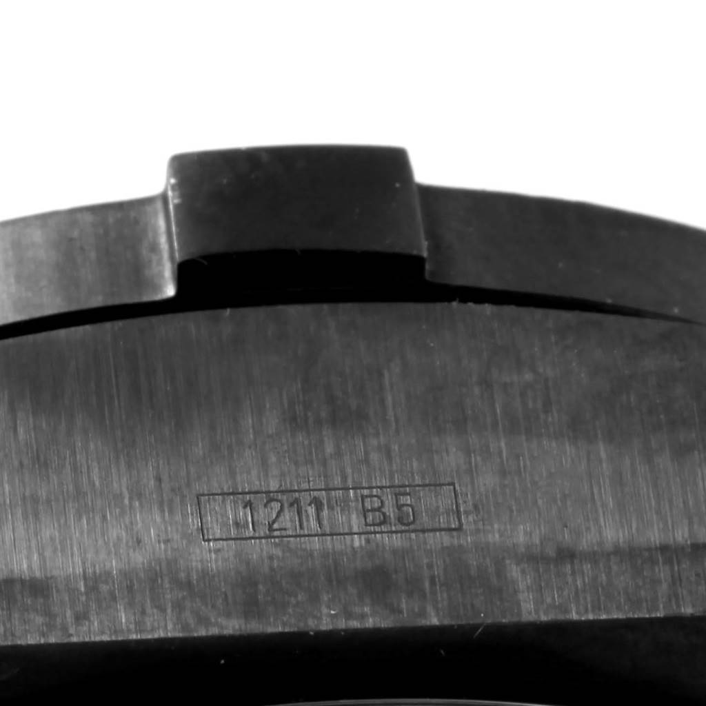 This image shows a close-up of the back of a Breitling Chronomat M73390 Men's Stainless Steel Black Dial M73390 Men's Stainless Steel Black Dial watch case.
