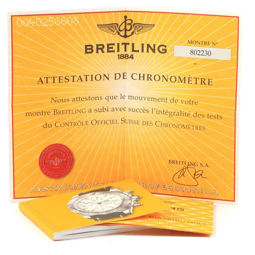 The image shows a Breitling Chronomat B13356 Men's Steel and Gold (two tone) Black Dial B13356 Men's Steel and Gold (two tone) Black Dial certificate of authenticity along with an instructional booklet.