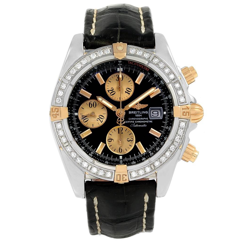 This image shows a front view of the Breitling Chronomat B13356 Men's Steel and Gold (two tone) Black Dial B13356 Men's Steel and Gold (two tone) Black Dial watch, highlighting its dial, bezel, and leather strap.