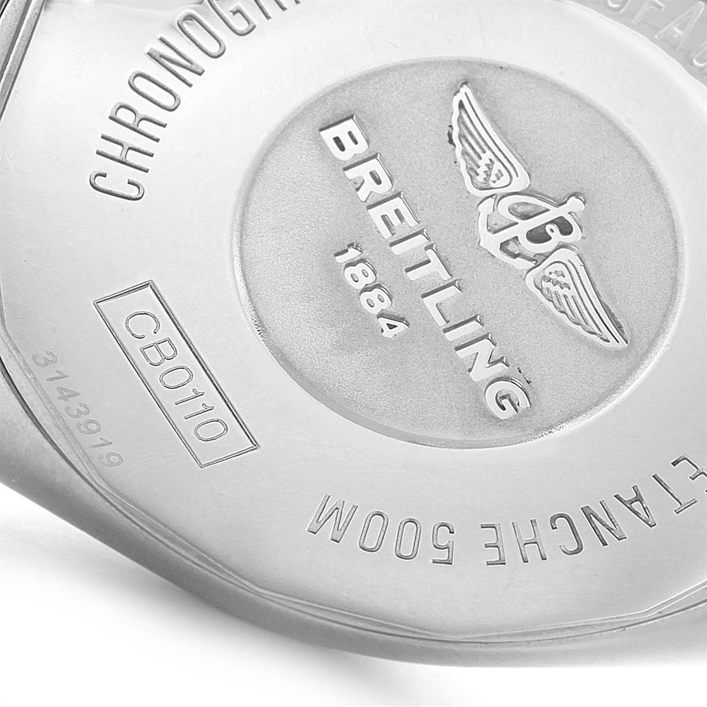 The image shows the back casing of the Breitling Chronomat CB0110 Men
s Steel and Gold (two tone) Blue Dial CB0110 Men
s Steel and Gold (two tone) Blue Dial model watch, featuring engravings and the brand’s logo.