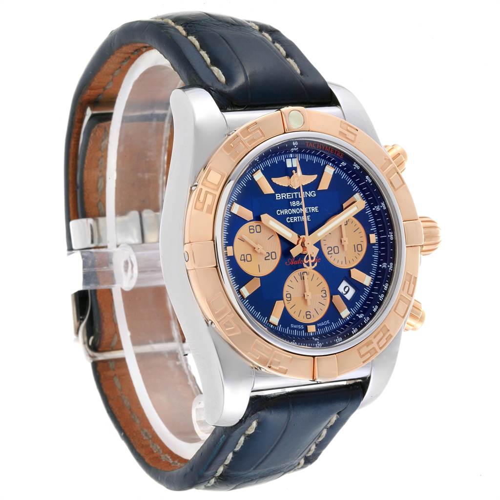 The Breitling Chronomat CB0110 Men
s Steel and Gold (two tone) Blue Dial CB0110 Men
s Steel and Gold (two tone) Blue Dial watch is shown at a front angle, highlighting the face, bezel, case, and leather strap.