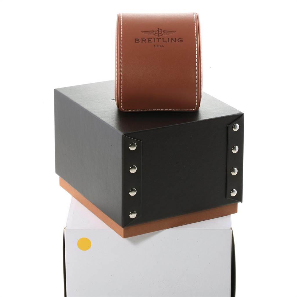 The image shows the packaging and storage box for the Breitling Chronomat CB0110 Men
s Steel and Gold (two tone) Blue Dial CB0110 Men
s Steel and Gold (two tone) Blue Dial model watch, featuring branded leather and a black box.