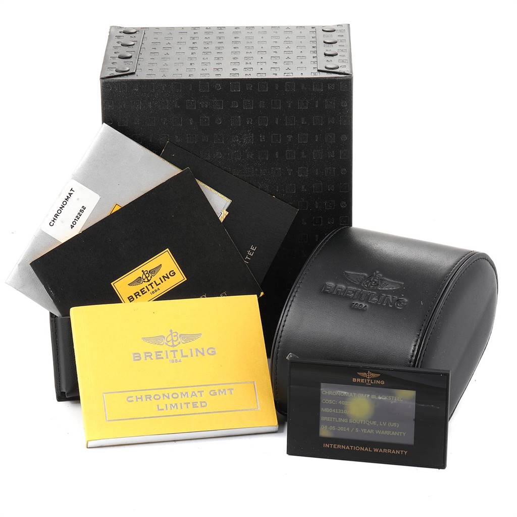 The image shows the accessories of a Breitling Chronomat MB041310/BC78-155S Men's Stainless Steel Black Dial MB041310/BC78-155S Men's Stainless Steel Black Dial watch, including booklets, a warranty card, a leather case, and the outer box.