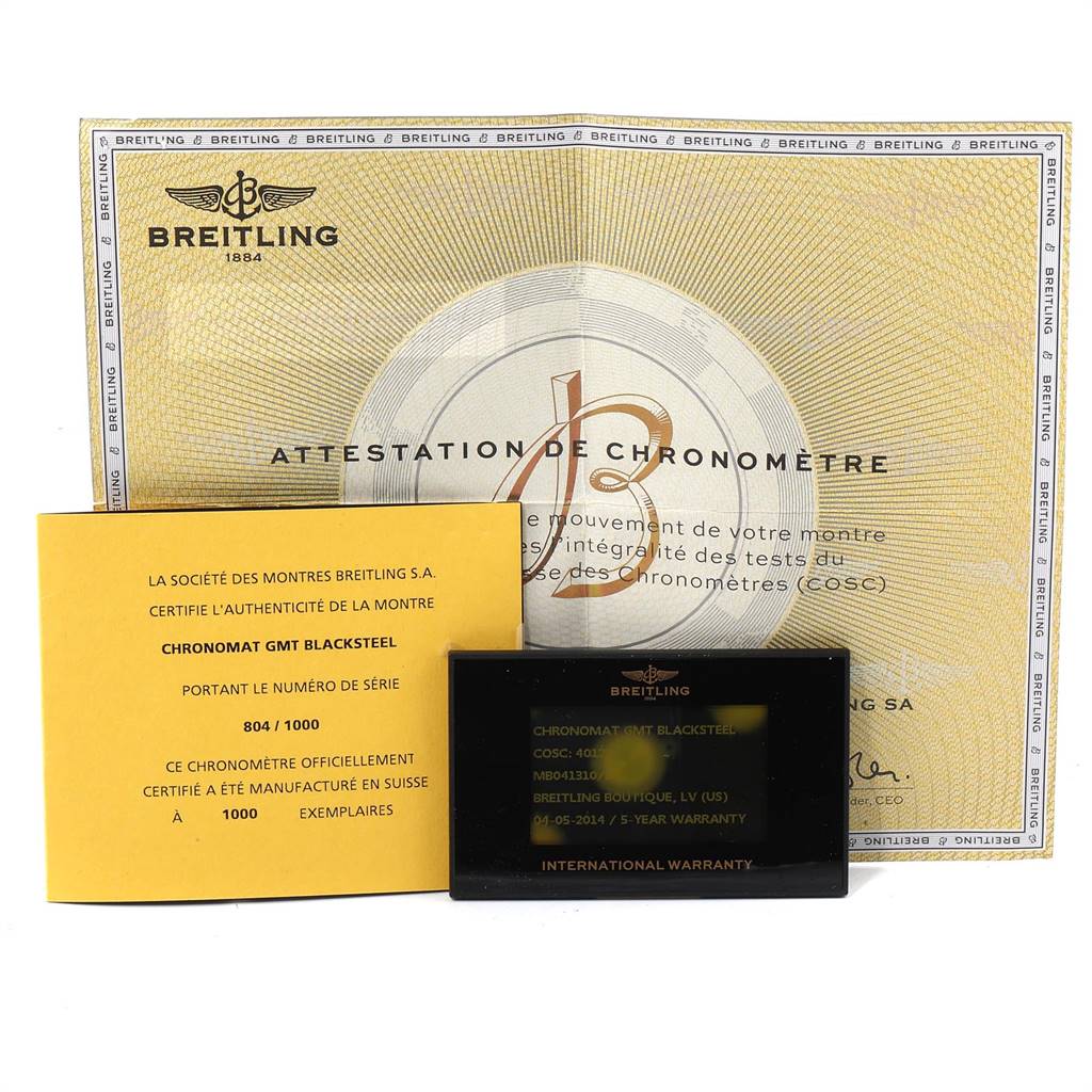 The image shows certification papers and an international warranty card for the Breitling Chronomat MB041310/BC78-155S Men's Stainless Steel Black Dial MB041310/BC78-155S Men's Stainless Steel Black Dial GMT Blacksteel model.