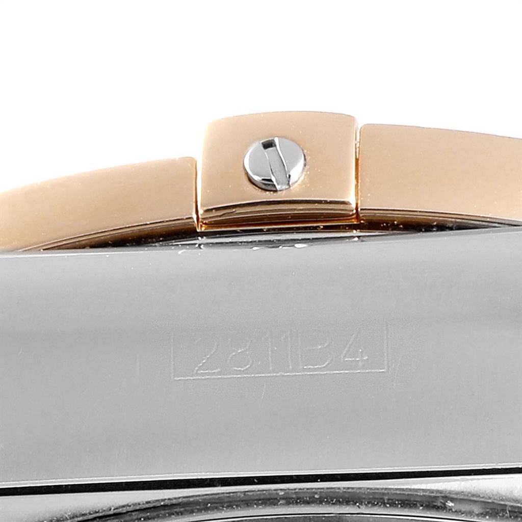 This close-up image shows part of the clasp and the side of the case of a Breitling Chronomat CB011012/C790 Men's Steel and Gold (two tone) Blue Dial CB011012/C790 Men's Steel and Gold (two tone) Blue Dial watch.