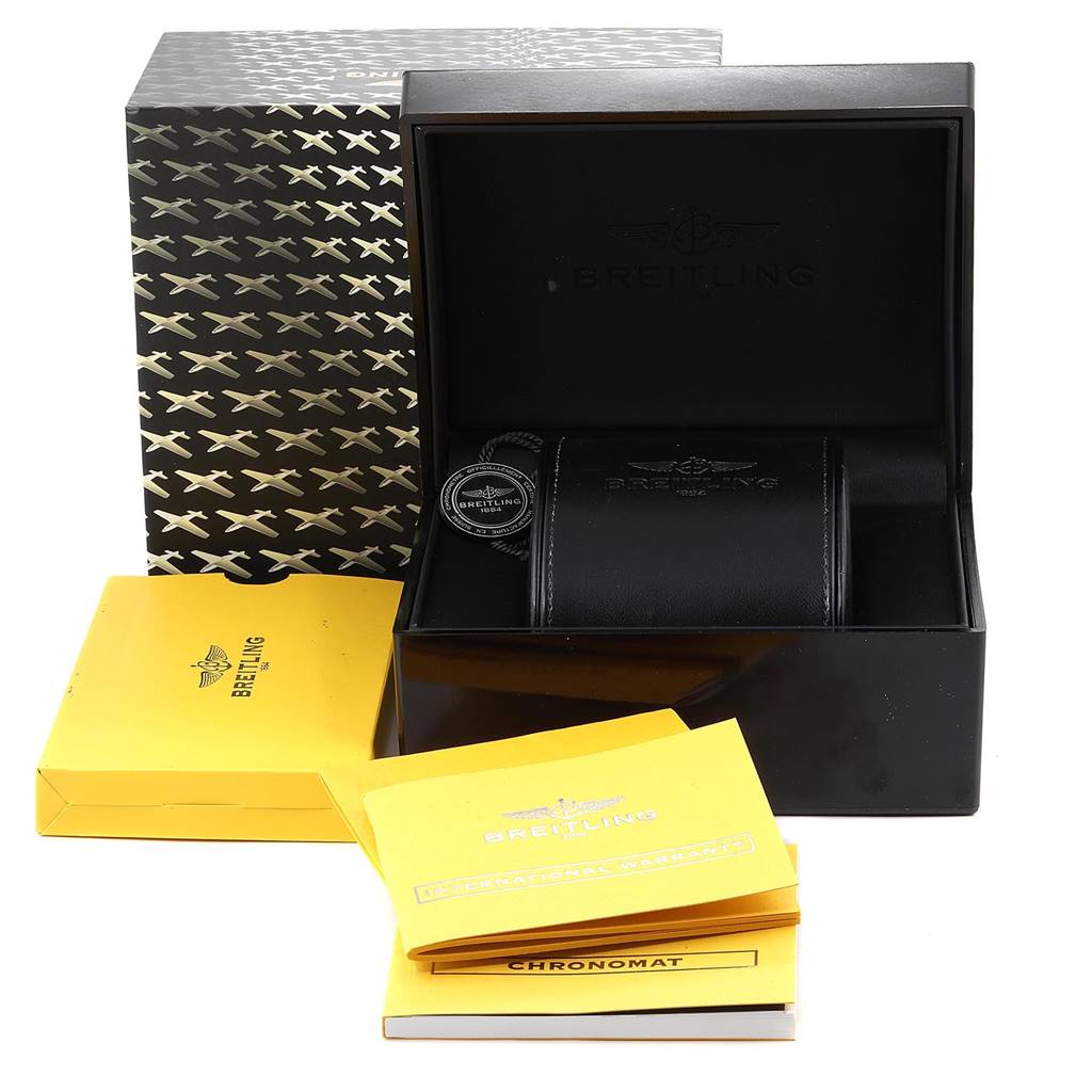 This image displays the packaging and accessories of the Breitling Chronomat CB011012/C790 Men's Steel and Gold (two tone) Blue Dial CB011012/C790 Men's Steel and Gold (two tone) Blue Dial watch, including the box, manual, and warranty cards.