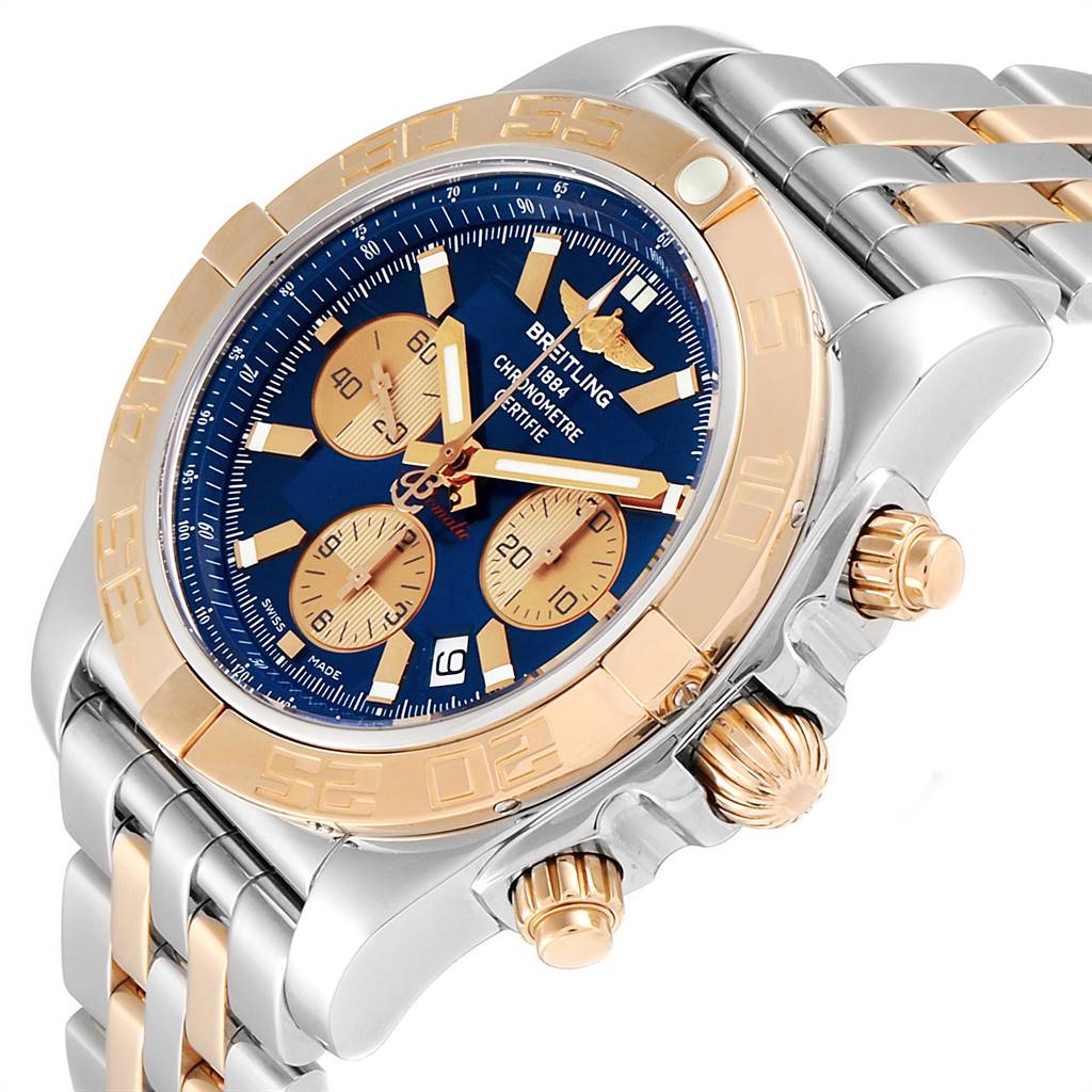 The Breitling Chronomat CB011012/C790 Men's Steel and Gold (two tone) Blue Dial CB011012/C790 Men's Steel and Gold (two tone) Blue Dial watch is shown at an angled view, highlighting its dial, bezel, and side pushers.