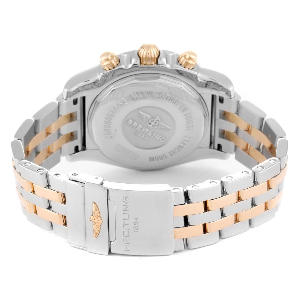 The image shows the back view of the Breitling Chronomat CB011012/C790 Men's Steel and Gold (two tone) Blue Dial CB011012/C790 Men's Steel and Gold (two tone) Blue Dial watch, highlighting the case back, pushers, and two-tone stainless steel bracelet with clasp.