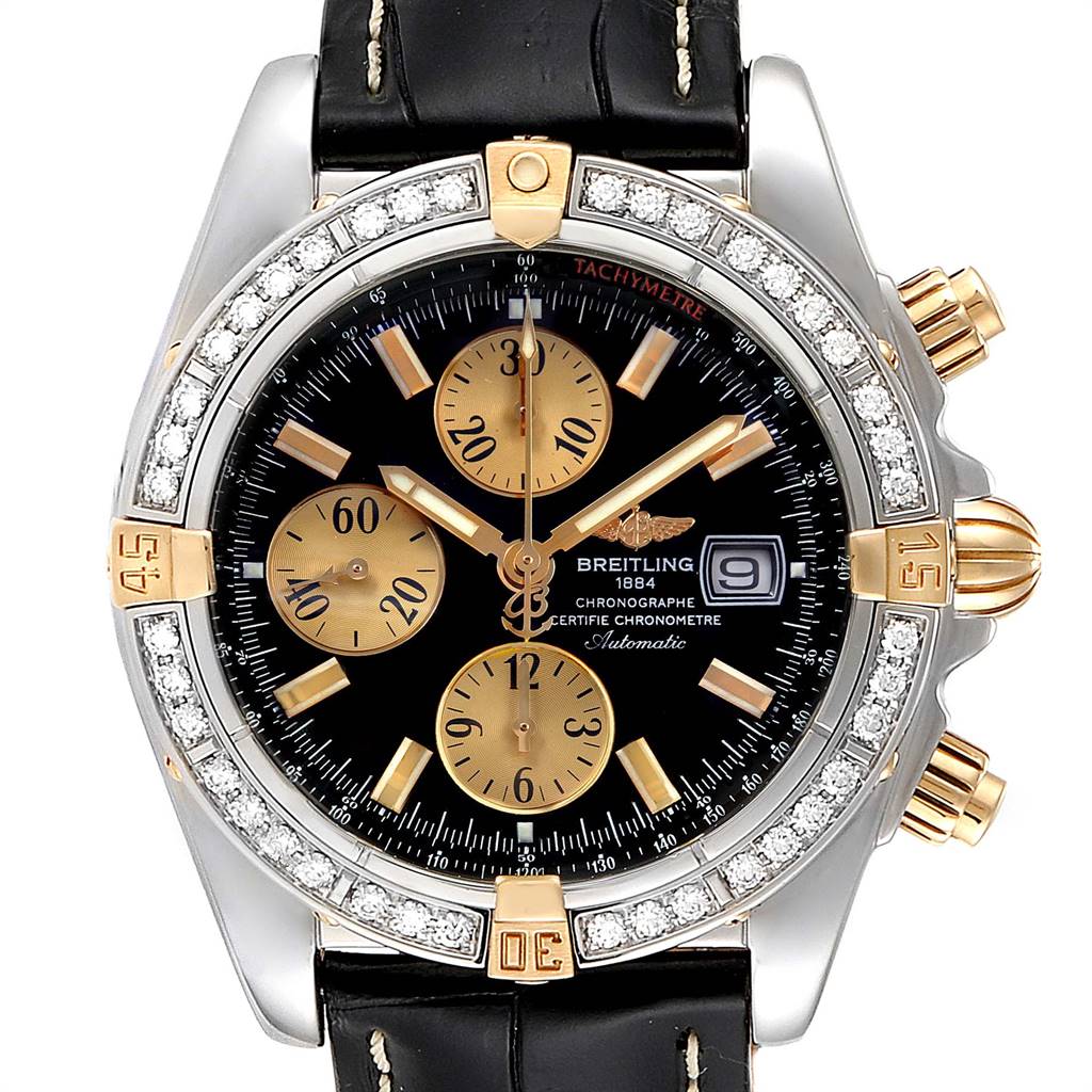 This image shows a top-down view of the Breitling Chronomat B13356 Men's Steel and Gold (two tone) Black Dial B13356 Men's Steel and Gold (two tone) Black Dial watch, highlighting its dial, sub-dials, bezel, and crown.
