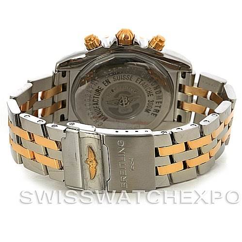 The image shows the back view of a Breitling Chronomat C1335611/K515-TT Men
s Stainless Steel Burgundy Dial C1335611/K515-TT Men
s Stainless Steel Burgundy Dial watch, including the case back and the two-tone metal bracelet.