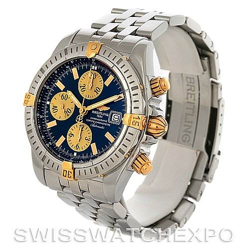 The image shows a Breitling Chronomat B1335611 Men's Steel and Gold (two tone) Blue Dial B1335611 Men's Steel and Gold (two tone) Blue Dial watch at an angled view, displaying the face, bezel, and bracelet prominently.